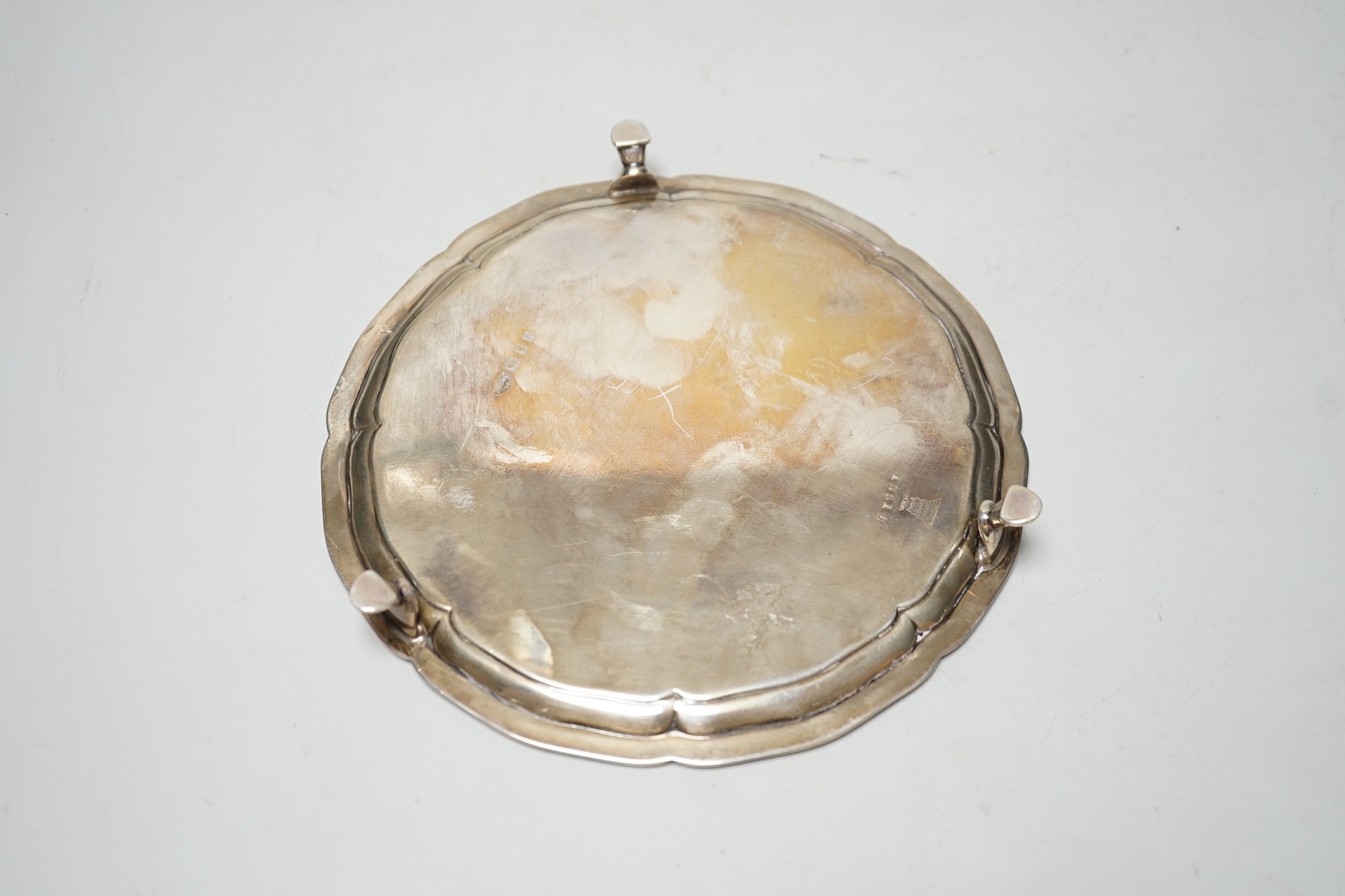 A George V silver waiter, London, 1923, on three hoof feet, 15.4cm, 7oz.